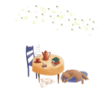 Em fundo branco, ilustração de cachorro caramelo peludo dormindo sobre tapete azul, ao lado de uma mesa com toalha laranja, sobre a qual há uma xícara fumegante de chá, uma chaleira e dois livros. A mesa possui apenas uma cadeira azul. Na parte de cima da imagem, há uma nuvem de vagalumes.